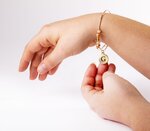 Bracelet  g avec perles blanches