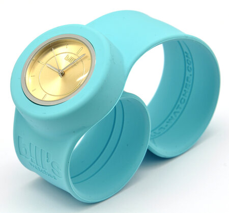 Montre classic bracelet bleu turq. Et cadran gold sun.