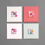 24 pompons en laine teintes pastel