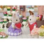Sylvanian families - 5369 - la grande soeur lapin creme et son bouquet de fleurs